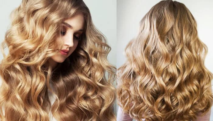 Beach Wave Types of Perms - Fashion in beauty - Fashion in Beauty Close-up of soft blonde curls created using a Beach Wave Perm for voluminous texture.