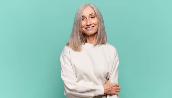 Blunt Cut - Fashion in beauty - Fashion in Beauty Best haircuts for women over 50 - Sleek, long gray hair styled with confidence.