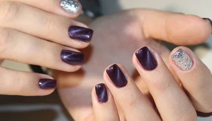 Diagonal or Side Cat Eye - Fashion in beauty - Fashion in Beauty Diagonal or Side Cat Eye design with purple and silver nails, a stylish approach for learning how to do cat eye nails at home.