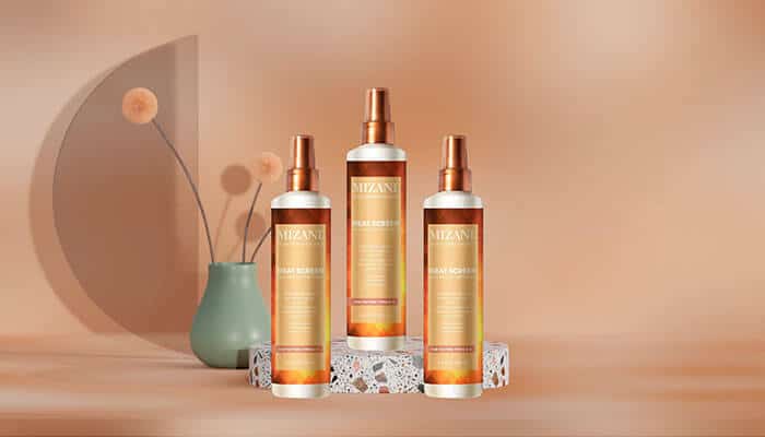 Mizani Heat Screen Hair Protectant Spray - Fashion in Beauty - Fashion in Beauty Mizani heat protectant sprays displayed in a warm studio setting, formulated for textured hair and heat styling, highlighted as a Best Heat Protectant Spray.