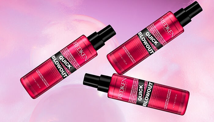 Redken Quick Blowout Heat Protectant Spray - Fashion in beauty - Fashion in Beauty Redken Quick Blowout bottles arranged on a vibrant background, formulated for fast drying and heat protection, recognized as a Best Heat Protectant Spray.