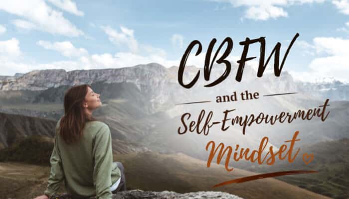 CBFW and the Self-Empowerment Mindset - Fashion In Beauty - Fashion in Beauty CBFW Meaning and the self-empowerment mindset concept illustrated through a scenic mountain landscape featuring a woman standing and looking toward vast hills and sky, symbolizing personal growth, independence, and emotional resilience. The visual represents how CBFW Meaning extends beyond social media slang into a deeper expression of confidence, self-worth, and mental empowerment in modern digital culture.