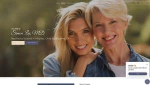 Simon Med Spa - Fashion in beauty - Fashion in Beauty Two smiling women posing outdoors on a hero banner for Dr. Simon Lee, MD, an aesthetics clinic; includes a'Book Online' button.