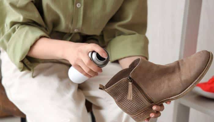 How to Protect Suede Shoes After Cleaning - Fashion In Beauty - Fashion in Beauty How to Clean Suede Shoes and protect them using a suede protector spray on a brown suede ankle boot to help prevent moisture damage and stains.